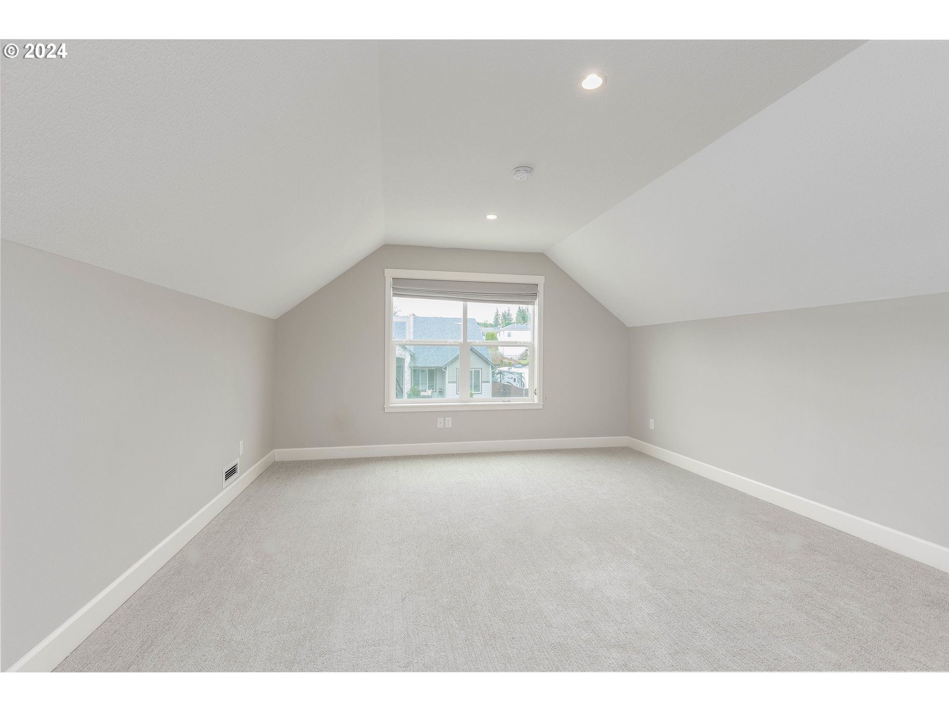 2714 Northeast 167th Circle Ridgefield, WA 98642 - Photo 27 of 35 a view of an empty room with a window