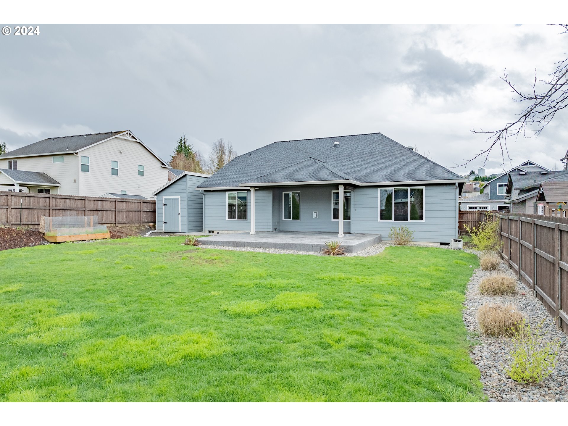 2714 Northeast 167th Circle Ridgefield, WA 98642 - Photo 31 of 35 a front view of a house with a yard