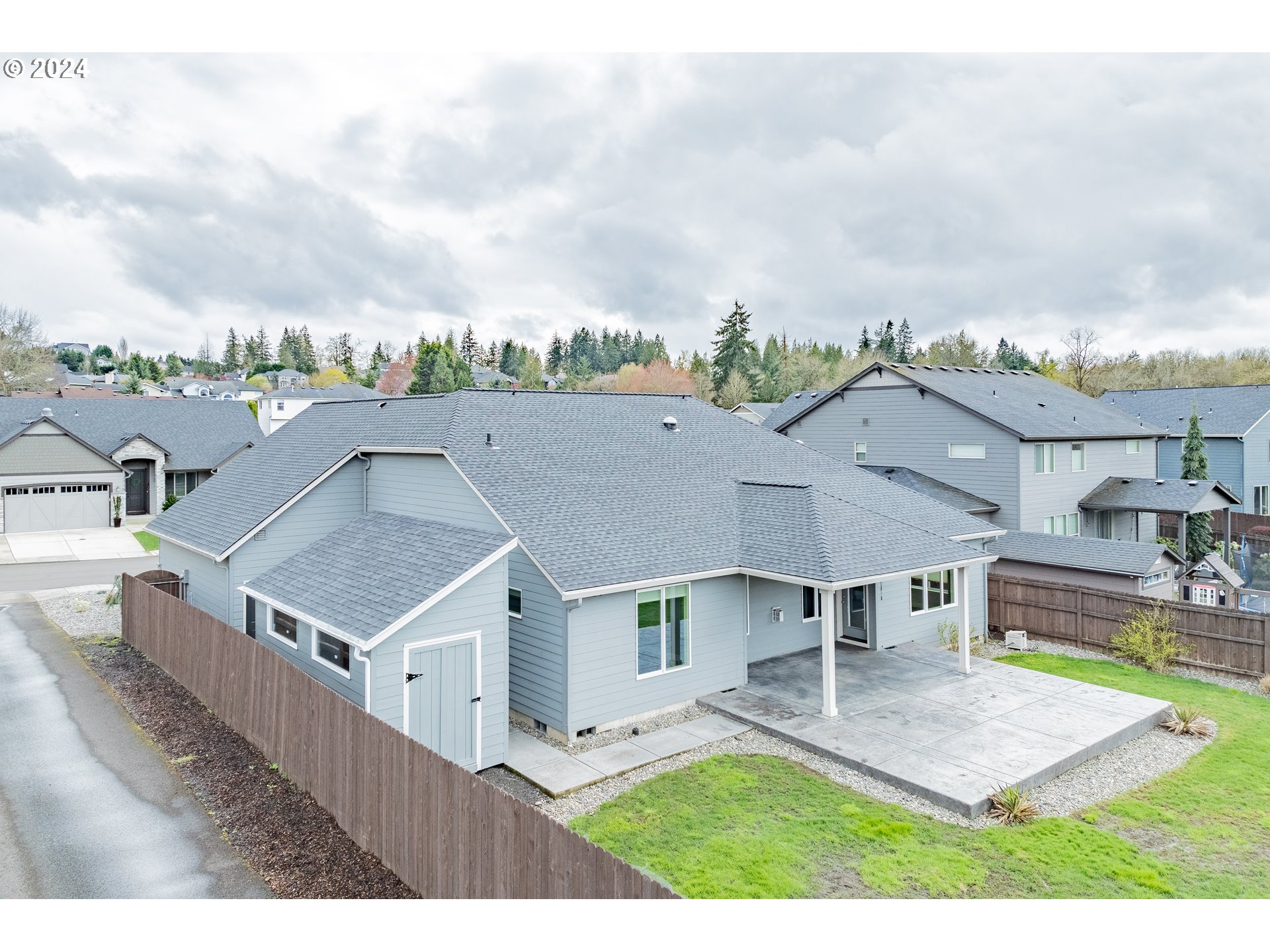 2714 Northeast 167th Circle Ridgefield, WA 98642 - Photo 33 of 35 an aerial view of a house with swimming pool and furniture