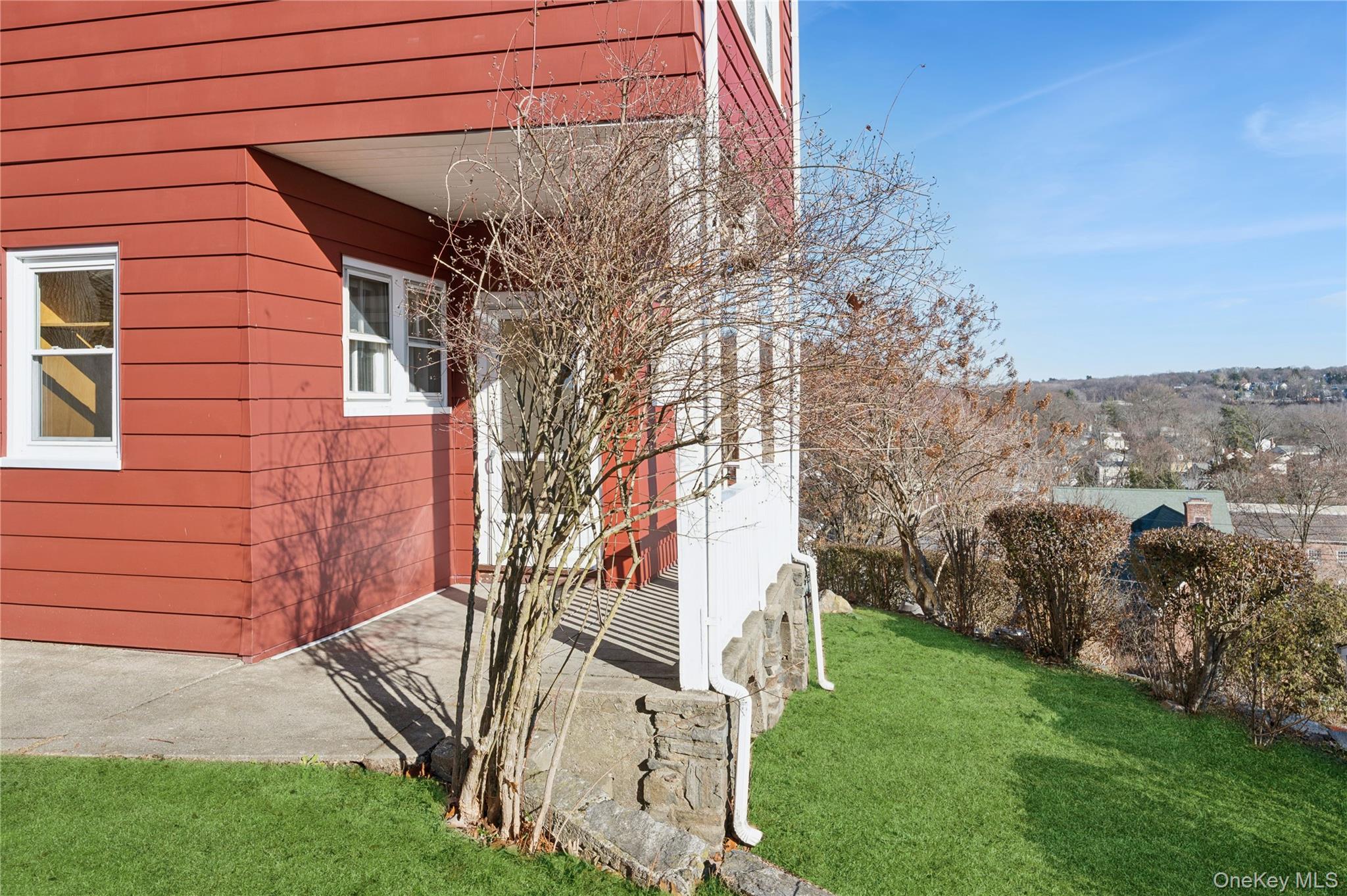 53 Allen Street, Unit 2 Dobbs Ferry, NY 10522 - Photo 24 of 28 View of home's exterior featuring a lawn