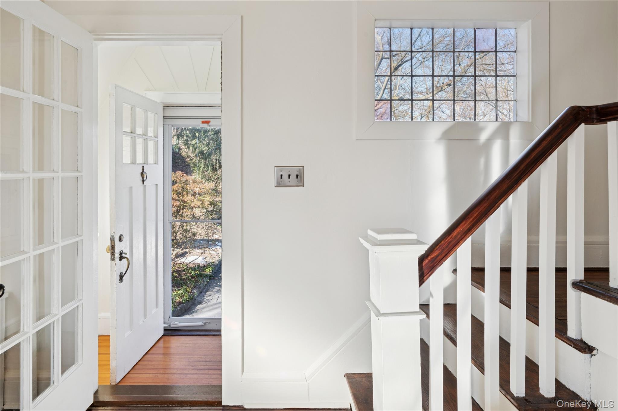 53 Allen Street, Unit 2 Dobbs Ferry, NY 10522 - Photo 3 of 28 Staircase with wood finished floors and baseboards
