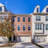 a front view of a building with many windows