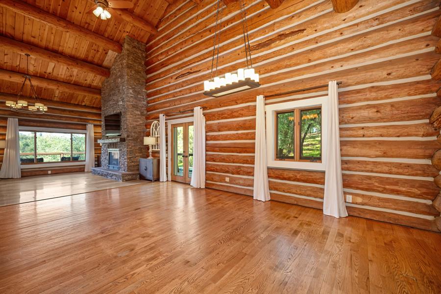 5000 Reservation Road Placerville, CA 95667 - Photo 13 of 85 a view of empty room with wooden floor and windows