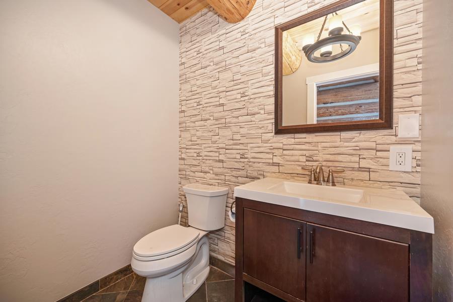 5000 Reservation Road Placerville, CA 95667 - Photo 34 of 85 a bathroom with a toilet sink and mirror