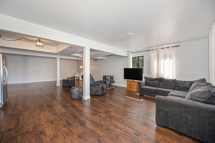 5000 Reservation Road Placerville, CA 95667 - Photo 35 of 85 a living room with furniture and a wooden floor