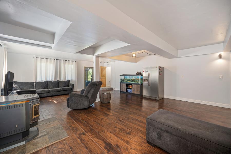 5000 Reservation Road Placerville, CA 95667 - Photo 39 of 85 a living room with furniture and a wooden floor