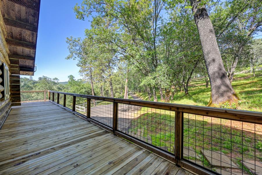 5000 Reservation Road Placerville, CA 95667 - Photo 57 of 85 a view of balcony with wooden floor and fence