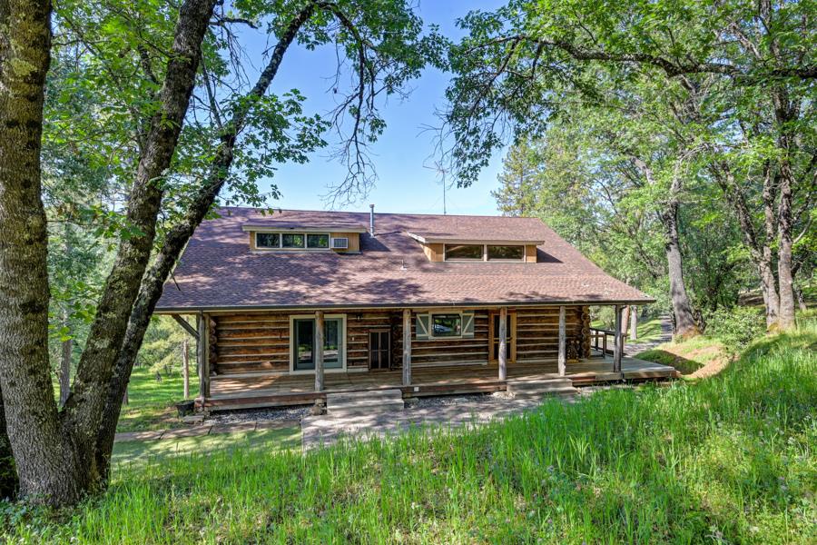 5000 Reservation Road Placerville, CA 95667 - Photo 6 of 85 a front view of a house with a garden
