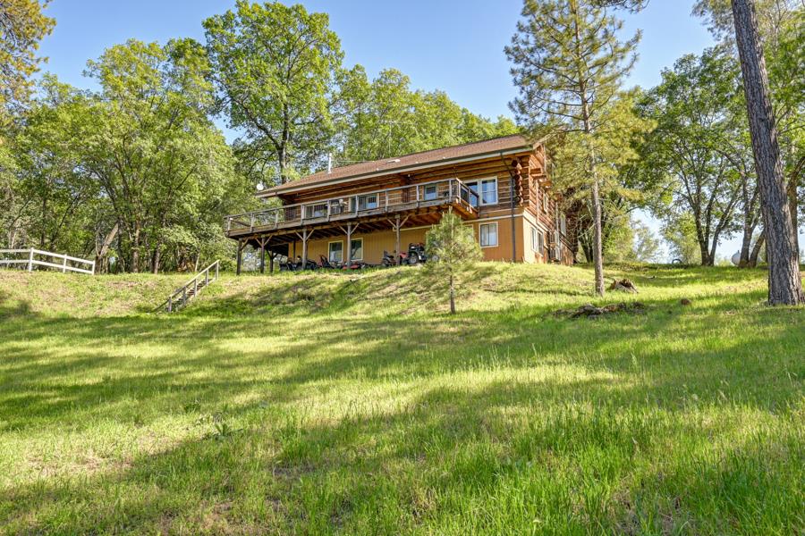 5000 Reservation Road Placerville, CA 95667 - Photo 64 of 85 a view of a house with a big yard and large trees