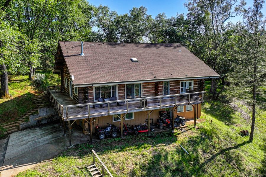 5000 Reservation Road Placerville, CA 95667 - Photo 69 of 85 a aerial view of a house with a yard table and chairs