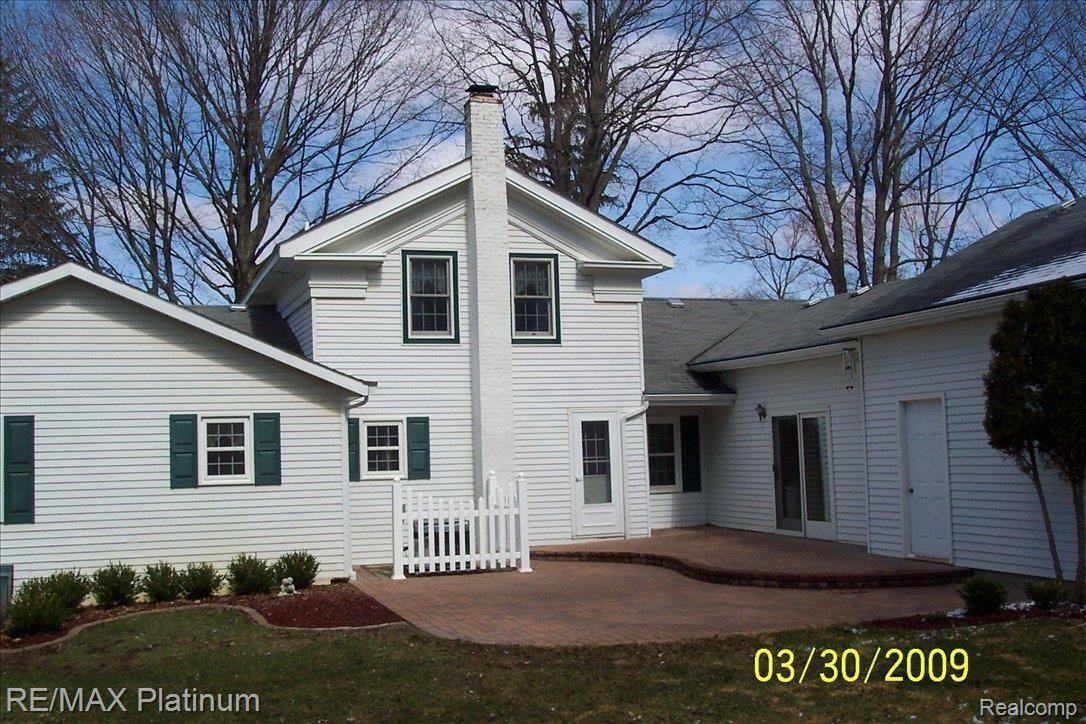 4740 Crooked Lake Road Howell, MI 48843 - Photo 5 of 21 rear view