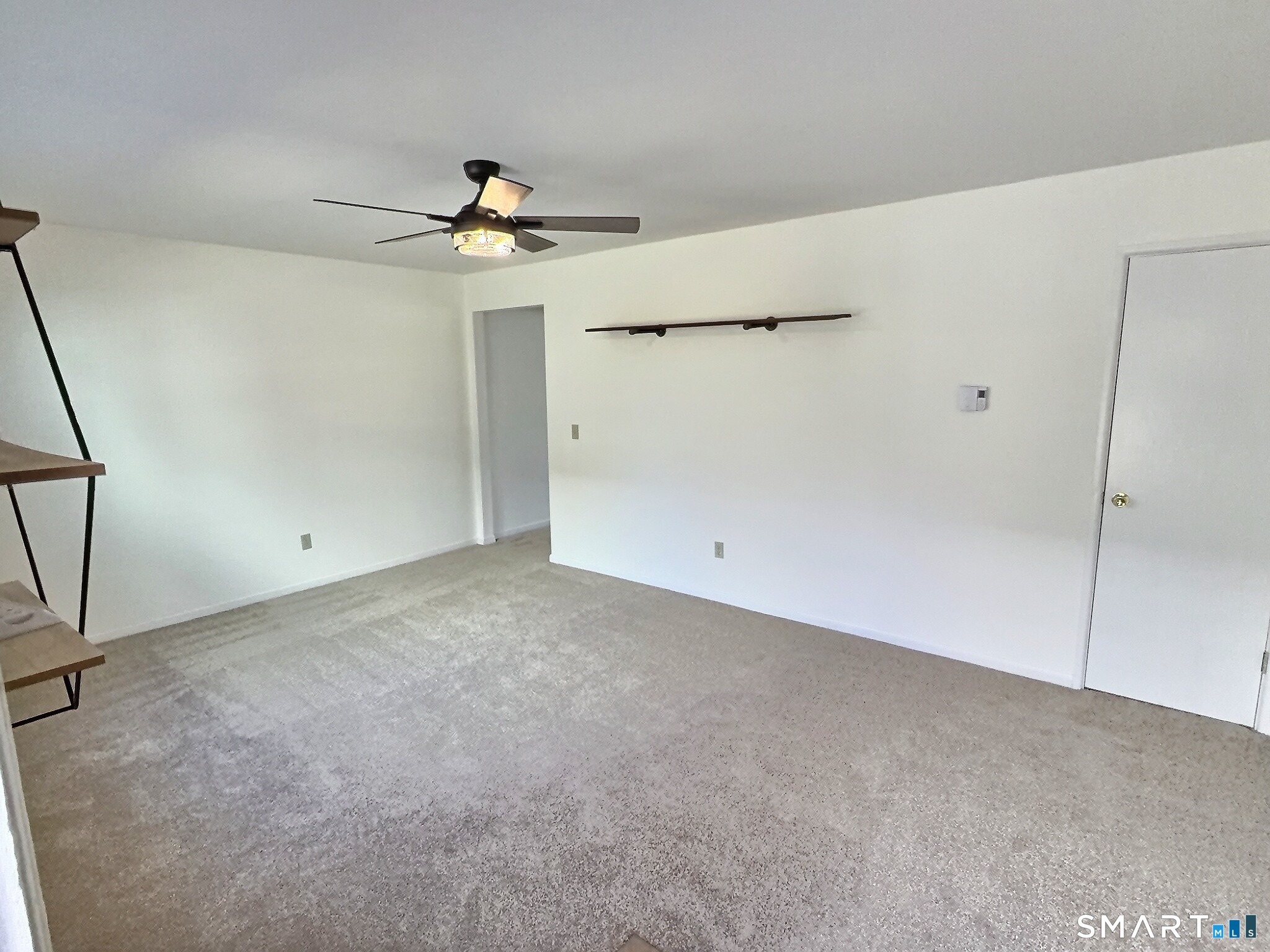 61 Dover Court, Unit B Branford, CT 06405 - Photo 3 of 14 a view of a room with an empty space