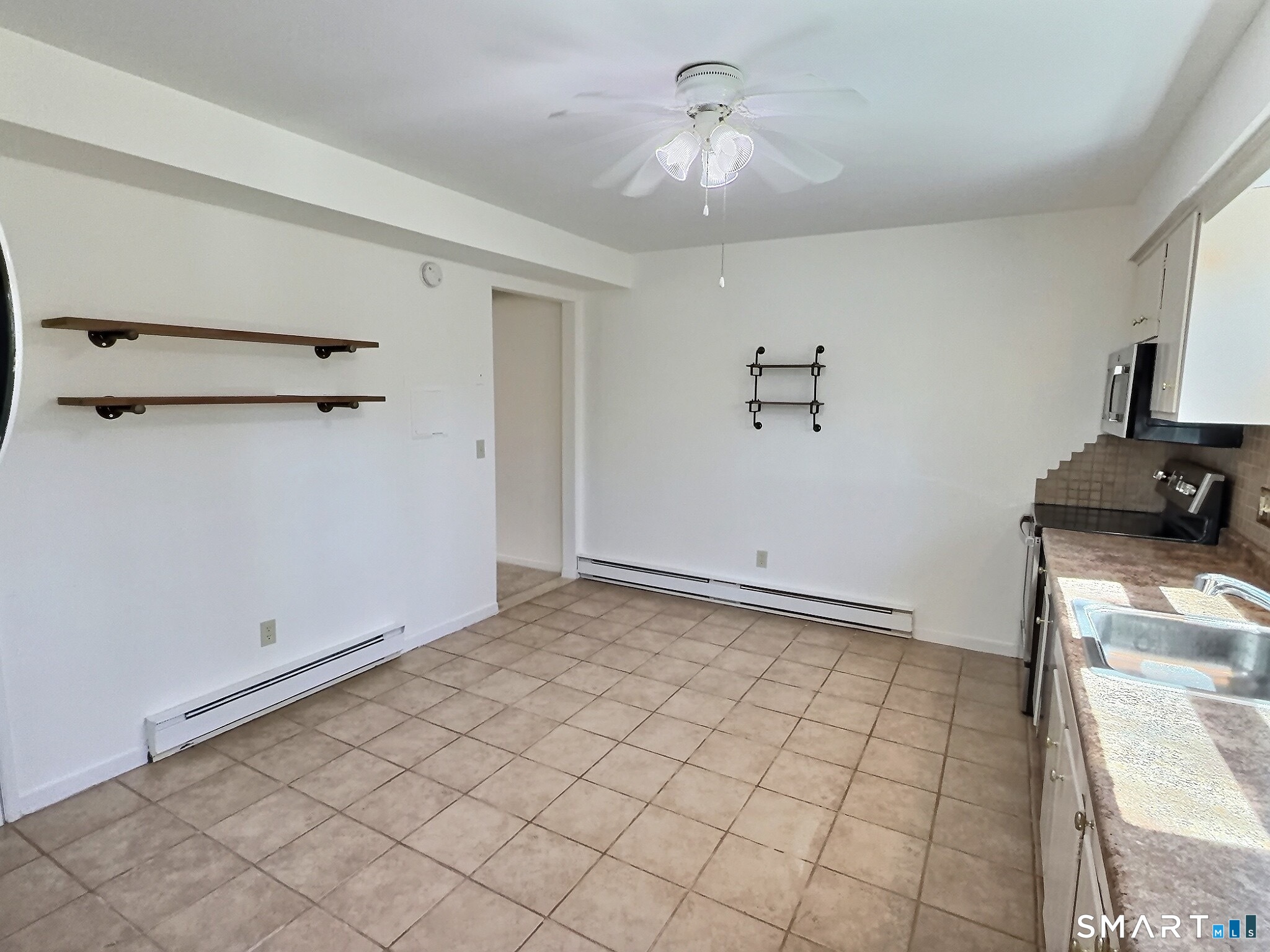 61 Dover Court, Unit B Branford, CT 06405 - Photo 9 of 14 a view of an empty room