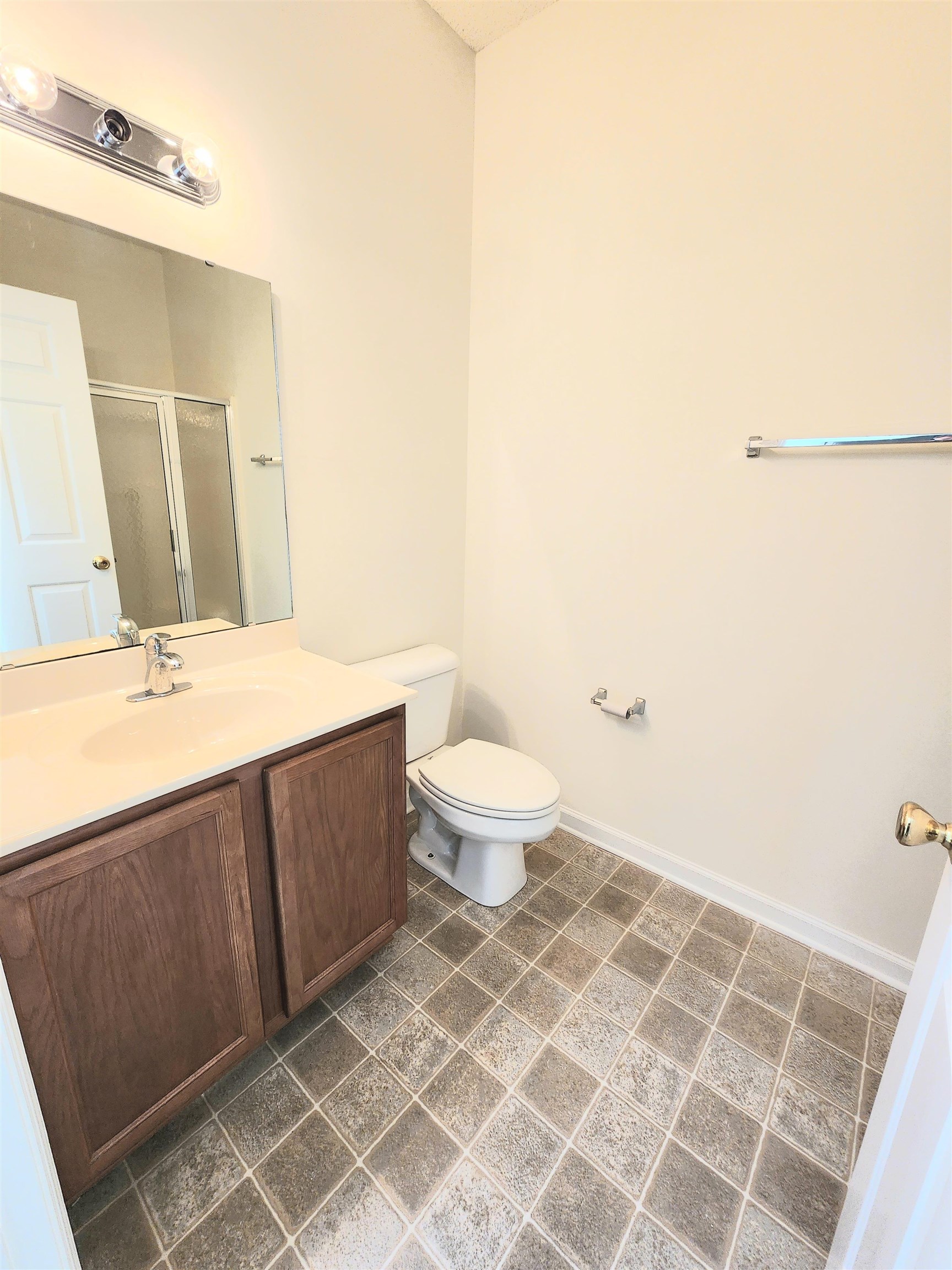 2080 Cross Gate Boulevard, Unit 105 Myrtle Beach, SC 29575 - Photo 18 of 25 Bathroom featuring vanity and a shower stall