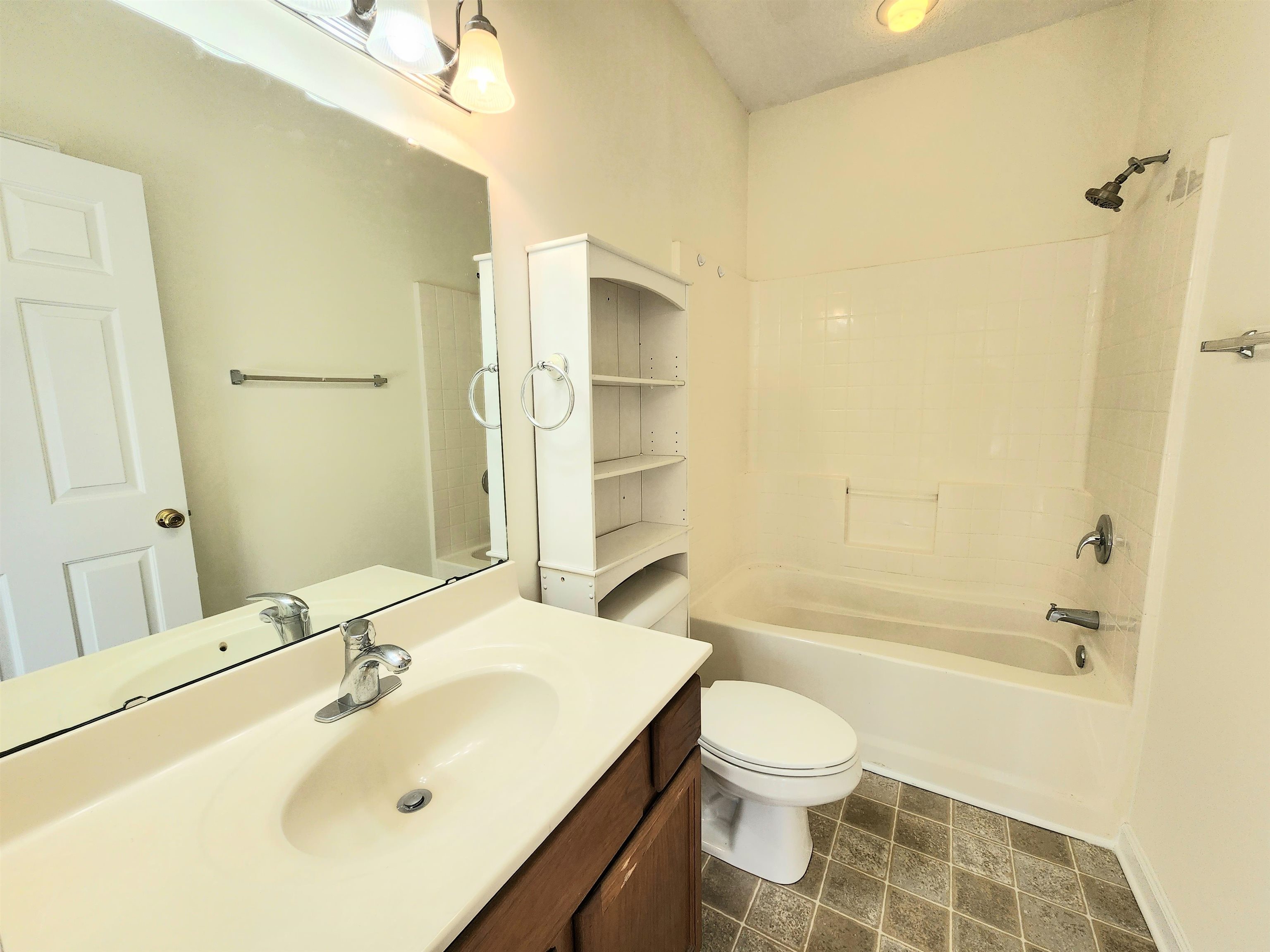 2080 Cross Gate Boulevard, Unit 105 Myrtle Beach, SC 29575 - Photo 21 of 25 Bathroom with shower / washtub combination and vanity