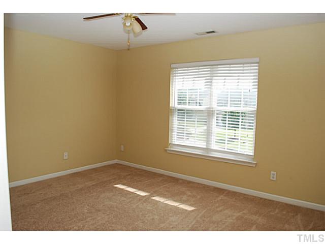 3117 Rendezvous Drive Raleigh, NC 27610 - Photo 17 of 22 a view of an empty room with a window