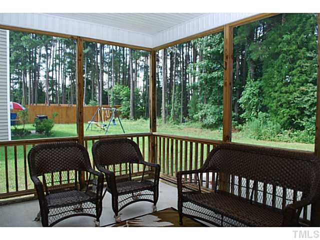 3117 Rendezvous Drive Raleigh, NC 27610 - Photo 20 of 22 a view of a chairs and table in the patio