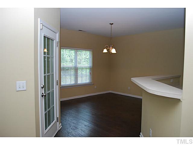 3117 Rendezvous Drive Raleigh, NC 27610 - Photo 5 of 22 a view of an empty room with a window