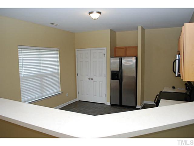 3117 Rendezvous Drive Raleigh, NC 27610 - Photo 7 of 22 a bathroom with a sink and a mirror