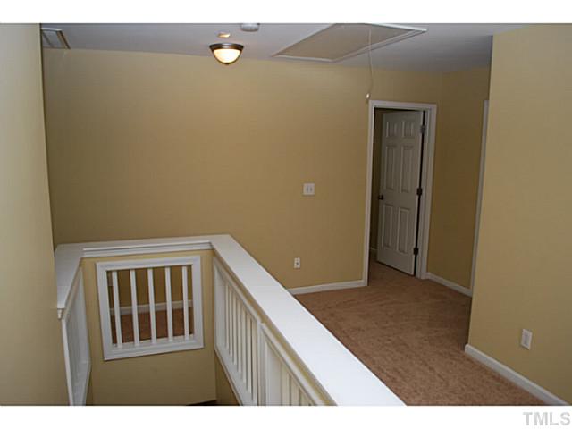 3117 Rendezvous Drive Raleigh, NC 27610 - Photo 9 of 22 a view of an empty room with windows