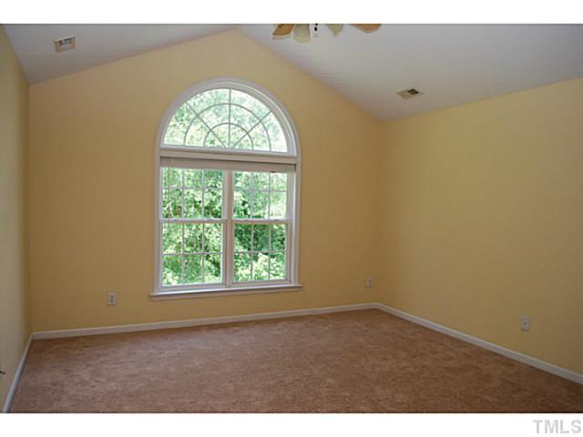 3117 Rendezvous Drive Raleigh, NC 27610 - Photo 10 of 22 an empty room with a window