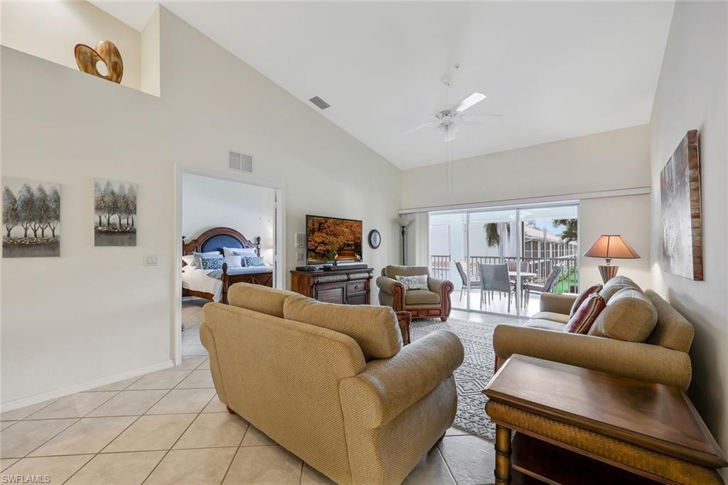 2395 Bayou Lane, Unit 7304 Naples, FL 34112 - Photo 12 of 27 LIVING ROOM