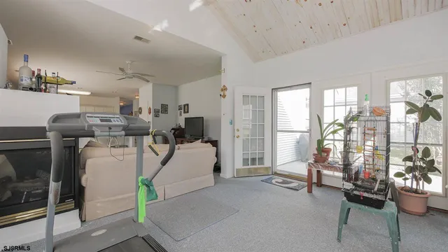 a living room filled with furniture and a couch