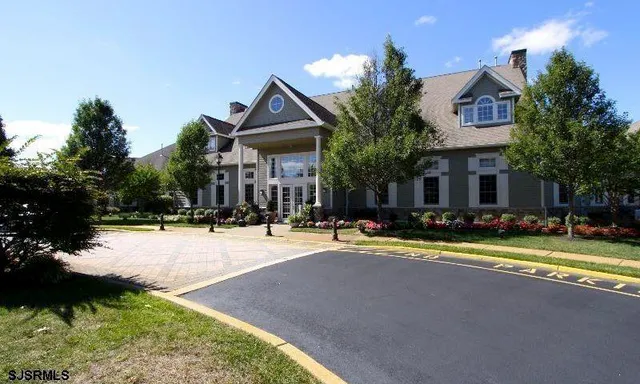 a view of swimming pool with outdoor seating
