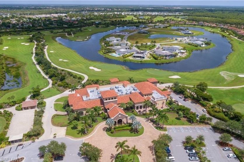 9590 Trevi Court, Unit 5317 Naples, FL 34113 - Photo 24 of 38 an aerial view of a house with outdoor space swimming pool