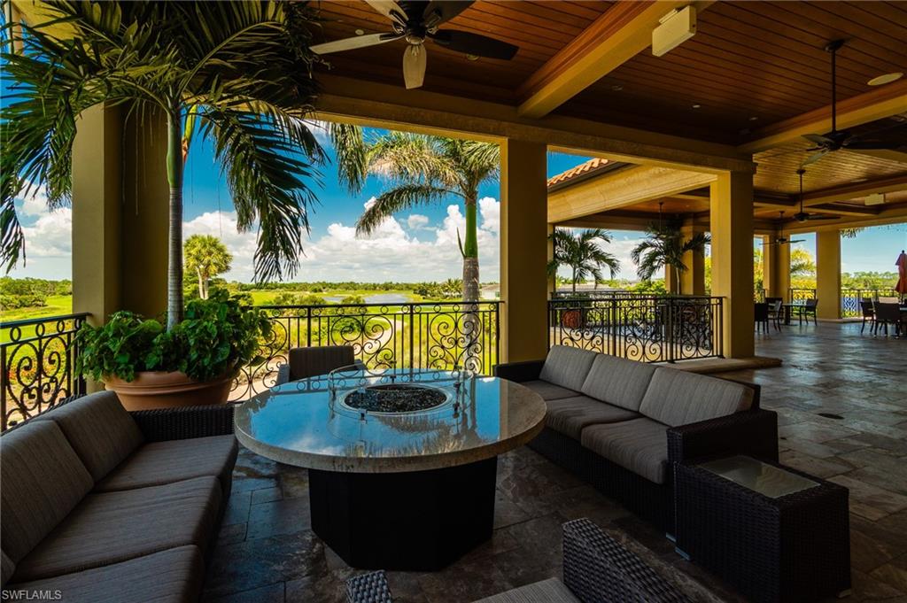 9590 Trevi Court, Unit 5317 Naples, FL 34113 - Photo 26 of 38 a outdoor living space with furniture and a potted plant