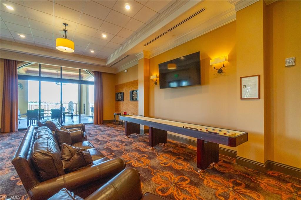 9590 Trevi Court, Unit 5317 Naples, FL 34113 - Photo 28 of 38 a outdoor living space with furniture