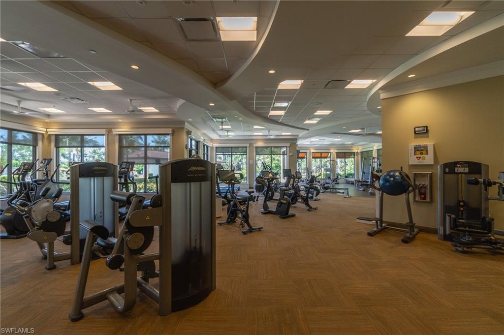 9590 Trevi Court, Unit 5317 Naples, FL 34113 - Photo 30 of 38 a view of a room with gym equipment