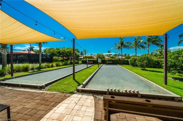 a view of a swimming pool with a patio