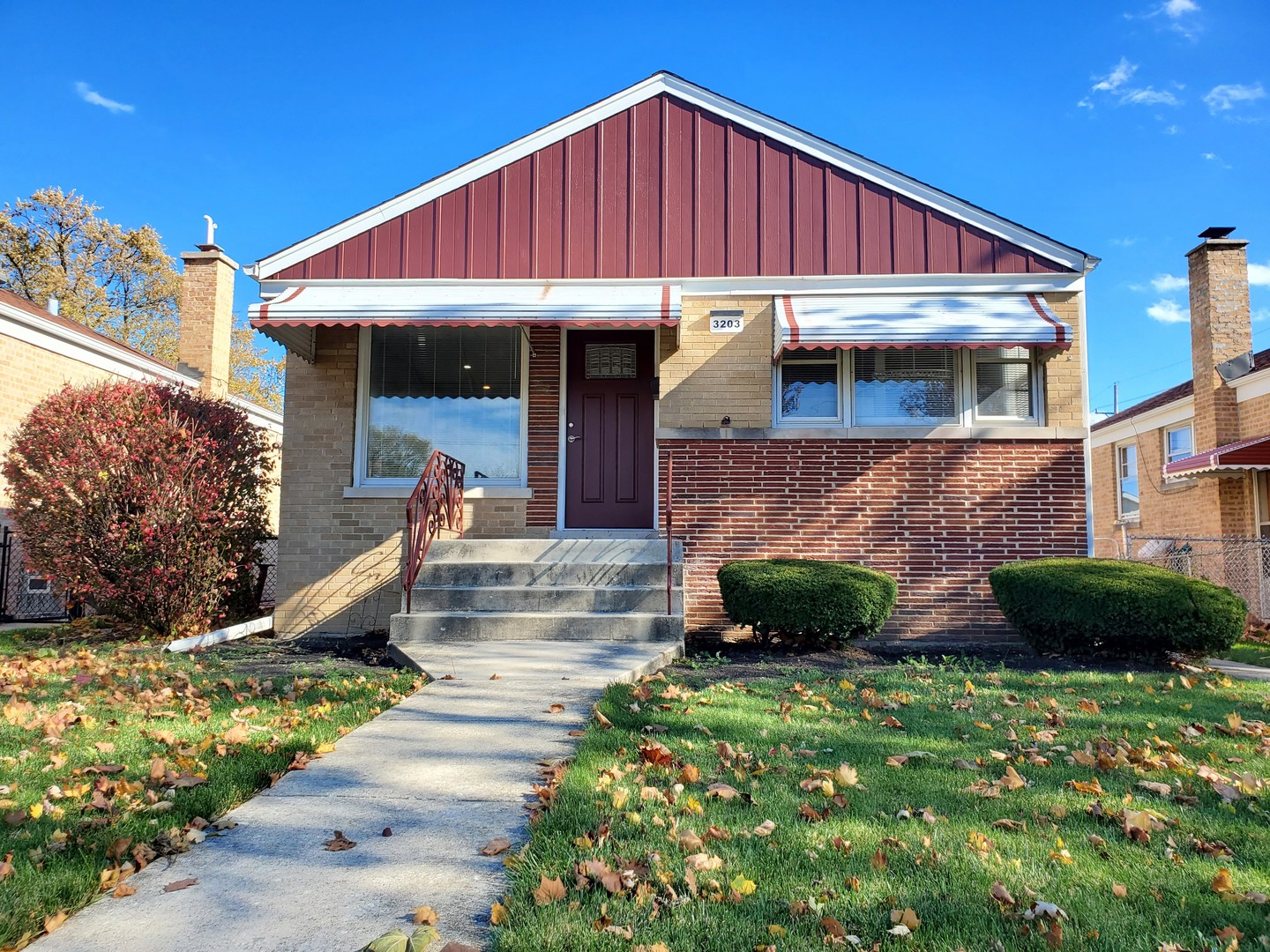 3203 Sunset Lane Franklin Park, IL 60131 - Photo 1 of 37 a front view of a house with garden