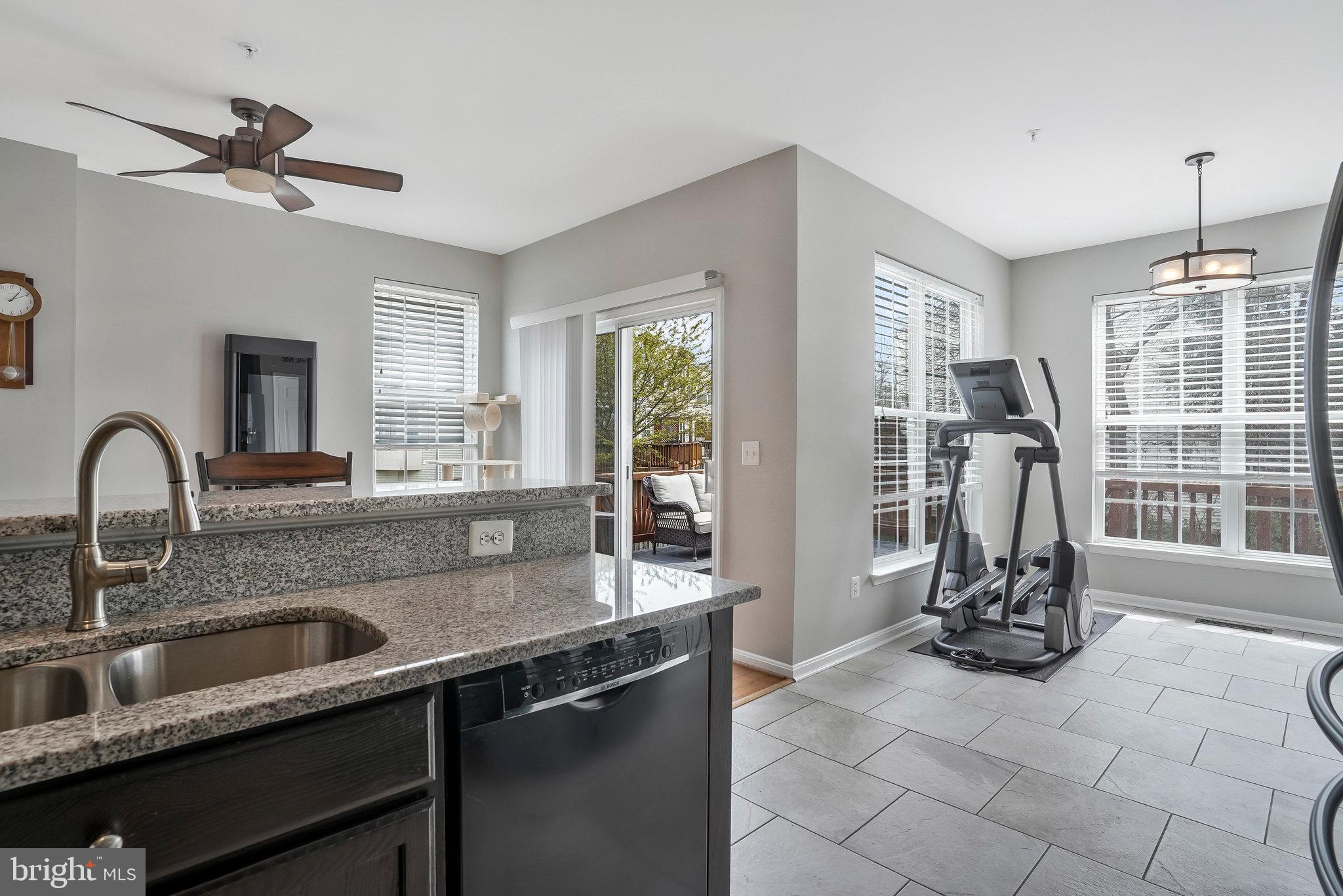 8110 Cerromar Way Gainesville, VA 20155 - Photo 13 of 51 Sunroom off Kitchen
