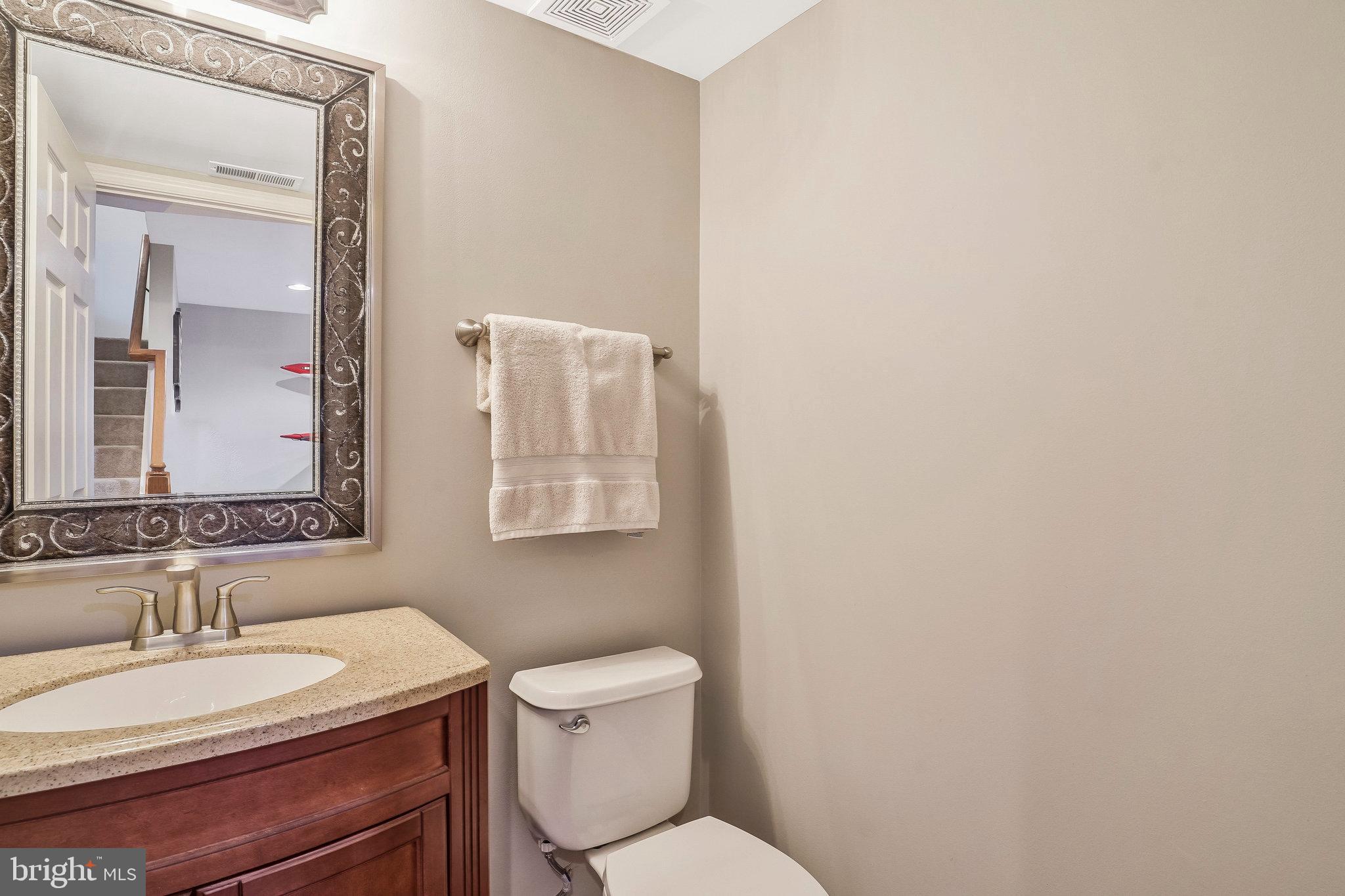8110 Cerromar Way Gainesville, VA 20155 - Photo 16 of 51 Main Level Powder Room