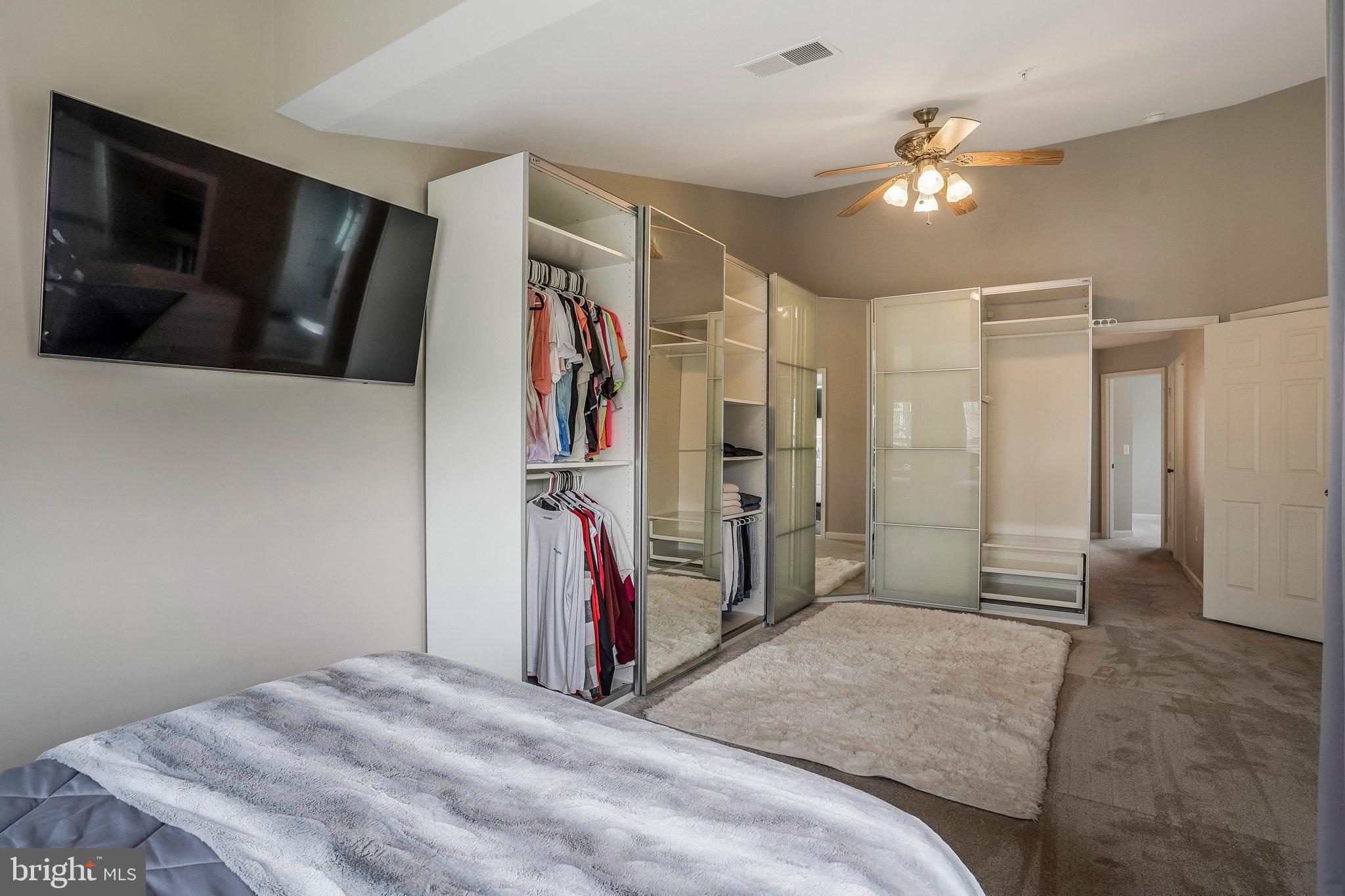 8110 Cerromar Way Gainesville, VA 20155 - Photo 21 of 51 Primary Bedroom w/ Lots of Closet Space!