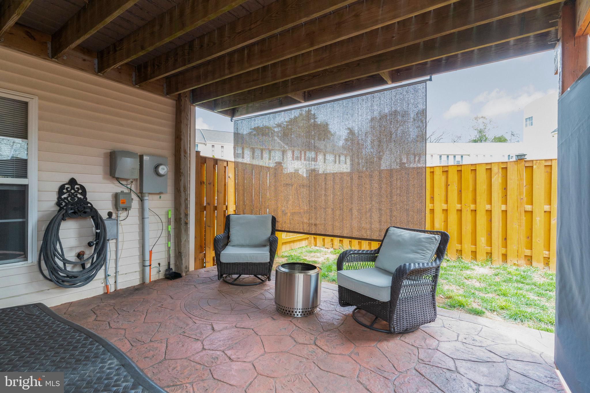 8110 Cerromar Way Gainesville, VA 20155 - Photo 42 of 51 Lower Level Patio w/ Privacy Screens