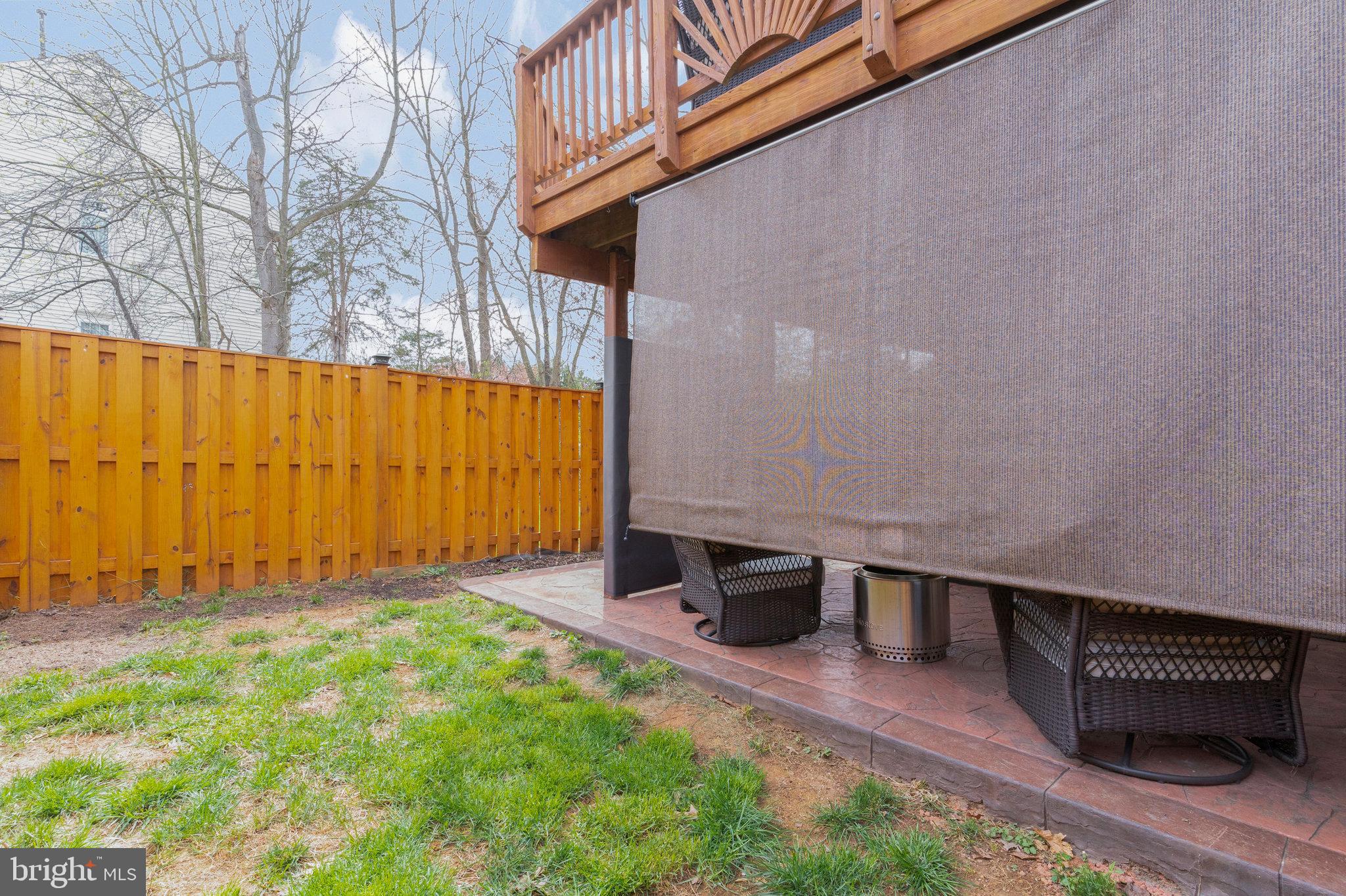 8110 Cerromar Way Gainesville, VA 20155 - Photo 44 of 51 Lower Level Patio w/ Privacy Screens