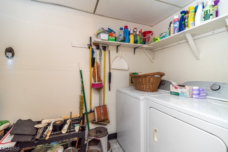 400 Mechlin Corner Road Pittstown, NJ 08867 - Photo 24 of 29 a utility room with dryer washer and shoe rack