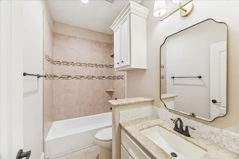 a bathroom with a sink and a tub