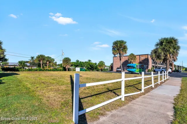a view of a swimming pool with a lounge chairs