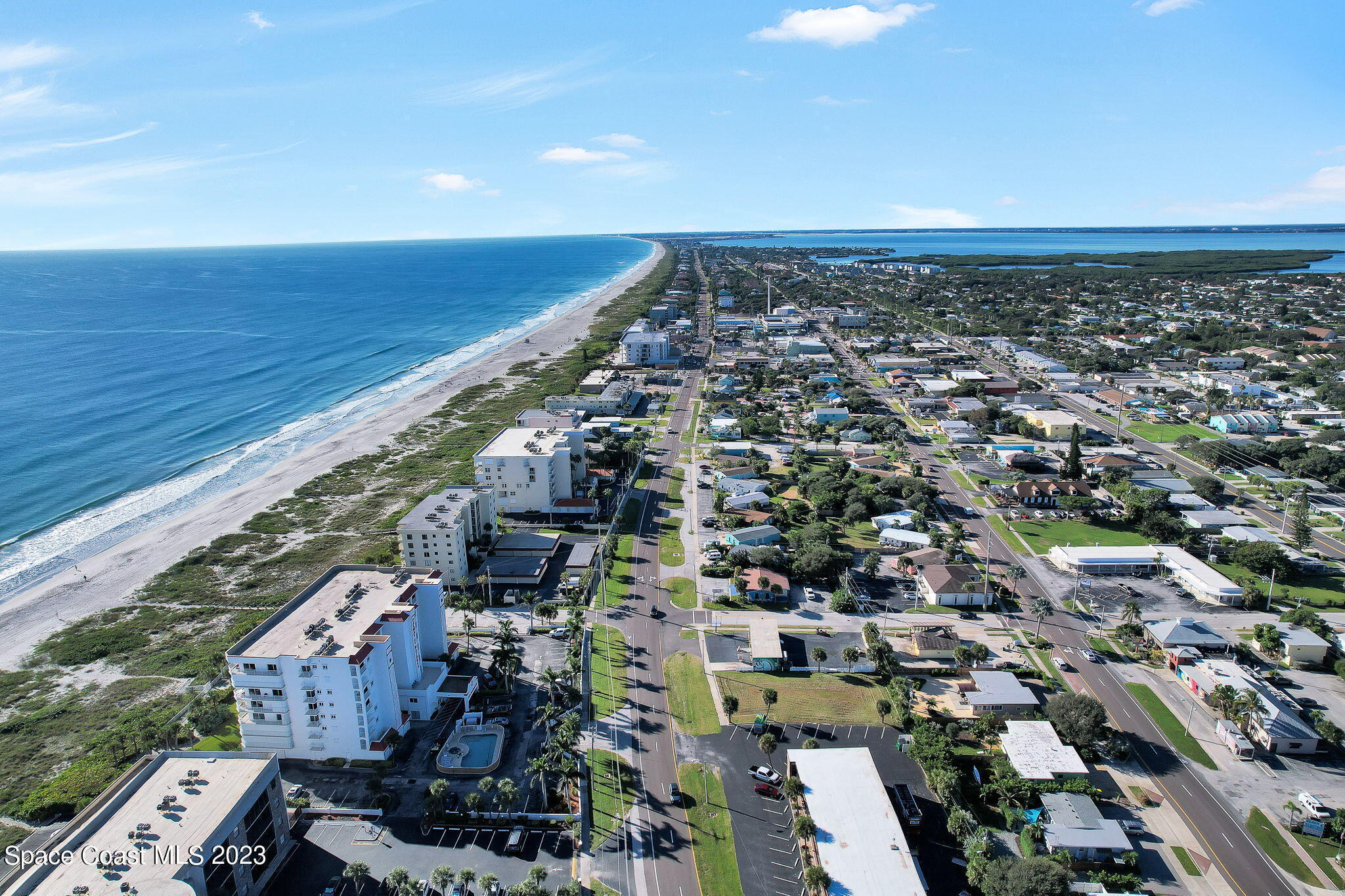 310 North Atlantic Avenue Cocoa Beach, FL 32931 - Photo 8 of 11 an aerial view of multiple house