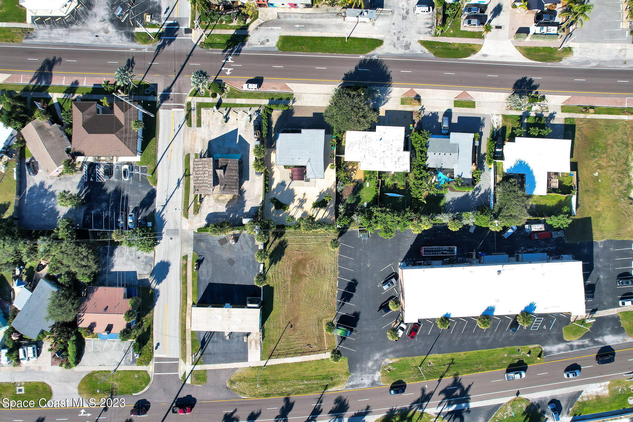310 North Atlantic Avenue Cocoa Beach, FL 32931 - Photo 9 of 11 a view of multiple houses with outdoor space
