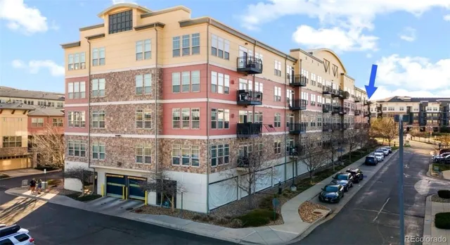 a city street lined with tall buildings