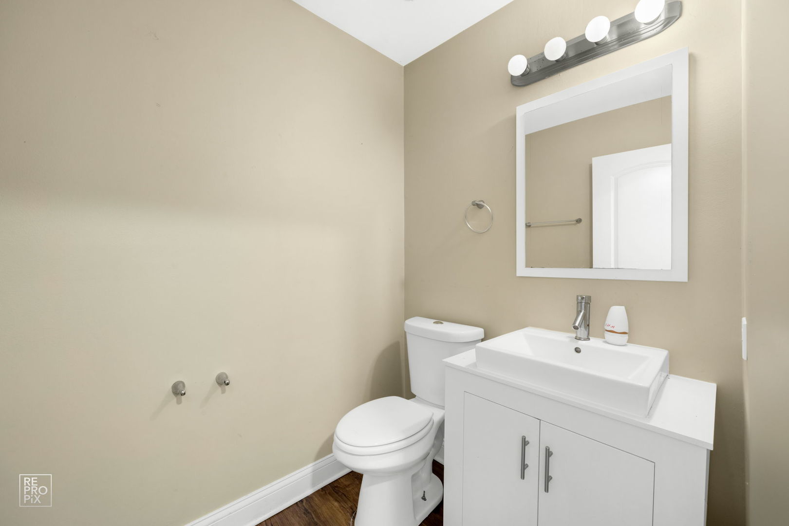48 Pheasant Road Matteson, IL 60443 - Photo 12 of 23 a bathroom with a sink a toilet and mirror