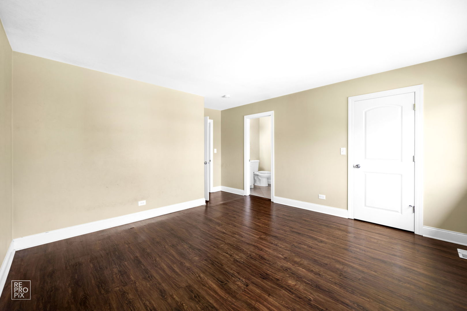 48 Pheasant Road Matteson, IL 60443 - Photo 14 of 23 a view of an empty room with wooden floor