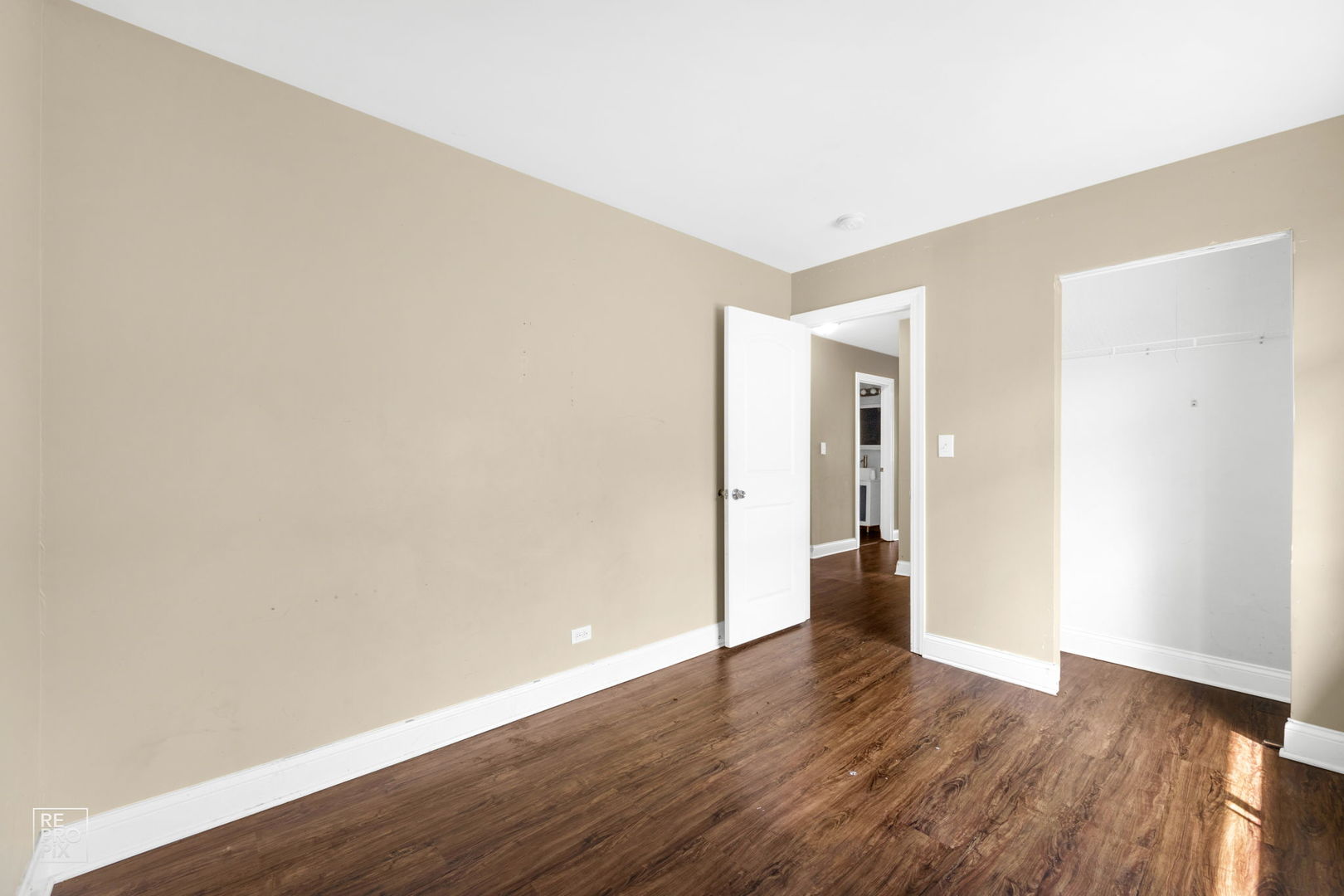 48 Pheasant Road Matteson, IL 60443 - Photo 19 of 23 a view of an empty room with wooden floor