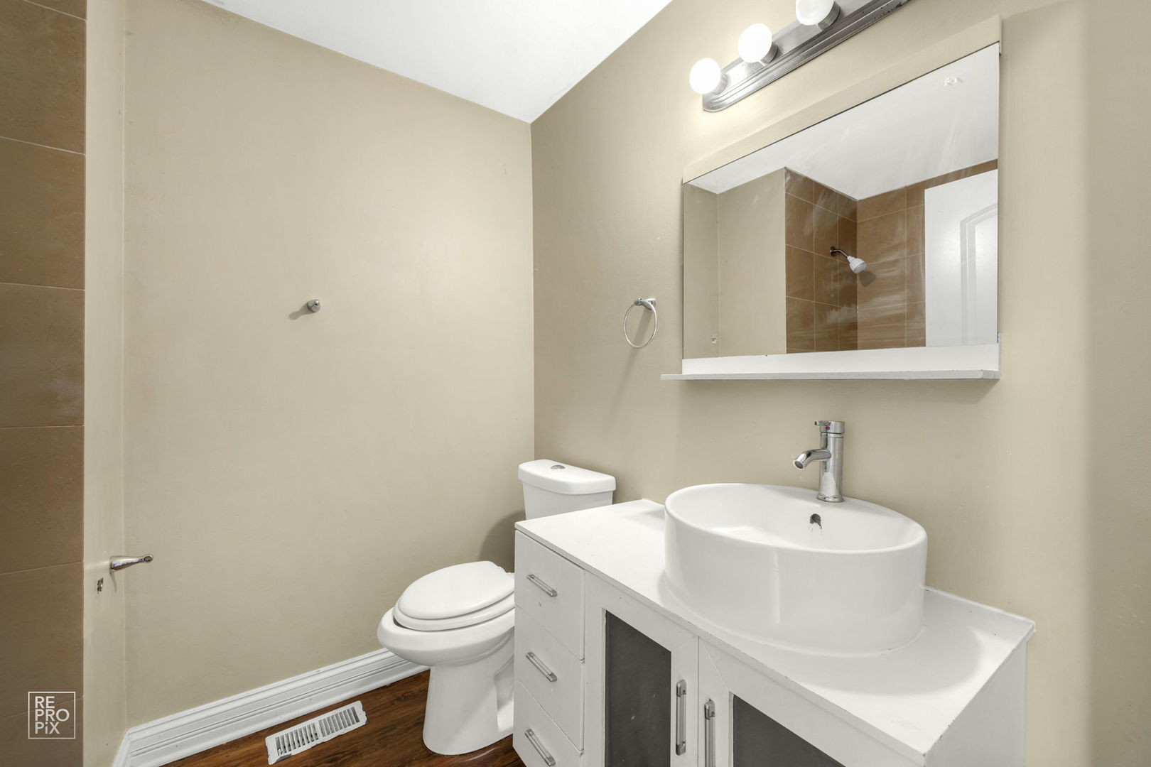 48 Pheasant Road Matteson, IL 60443 - Photo 20 of 23 a bathroom with a sink mirror and toilet