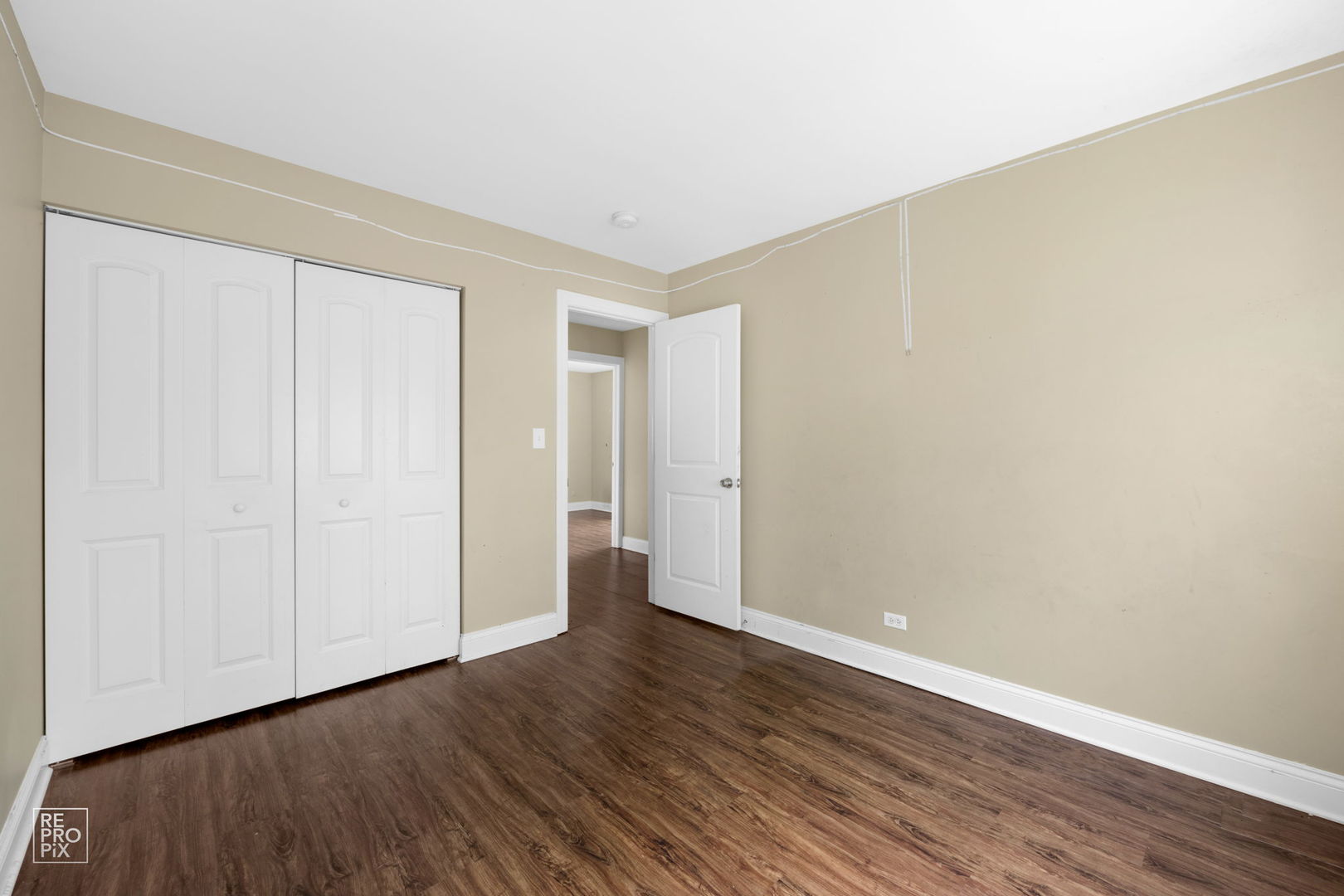 48 Pheasant Road Matteson, IL 60443 - Photo 23 of 23 a view of an empty room with wooden floor